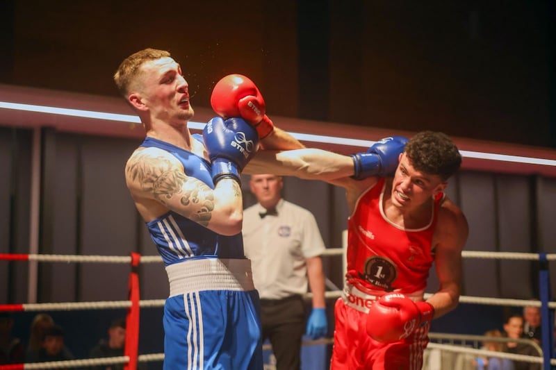 Jon McConnell catches Cahir Gormley in Thursday's light-middleweight semi-final - McConnell faces Matthew McCole on Saturday, in a repeat of their 2024 final. Picture by Mal McCann