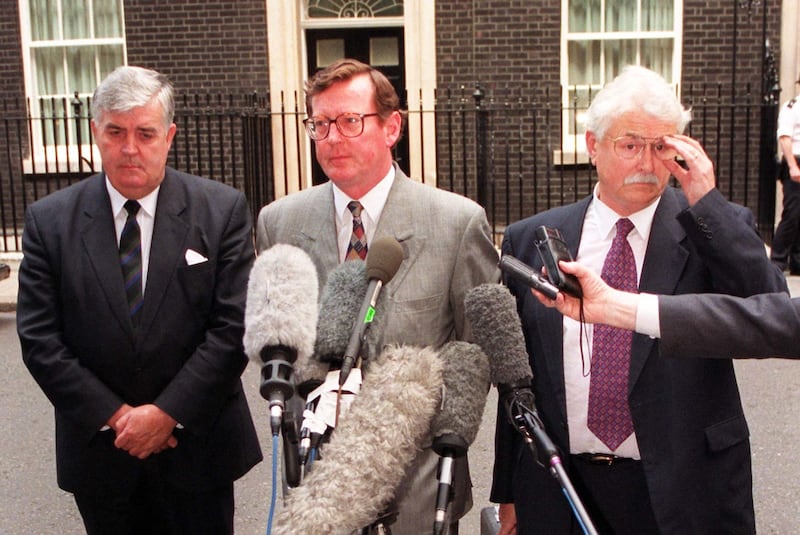 David Trimble, his deputy John Taylor and Ken Maginnis speak to the media outside Downing Street following talks with Tony Blair in 1997