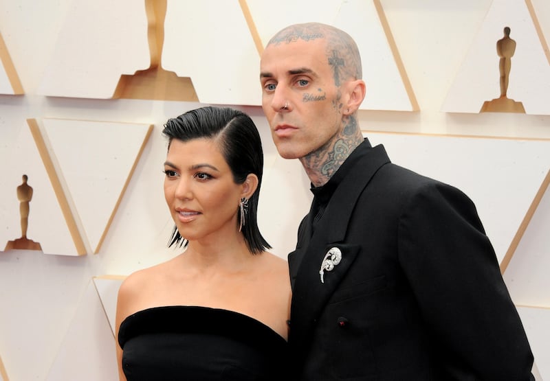 Travis Barker, the partner of Kourtney Kardashian, is famed for his facial tattoos