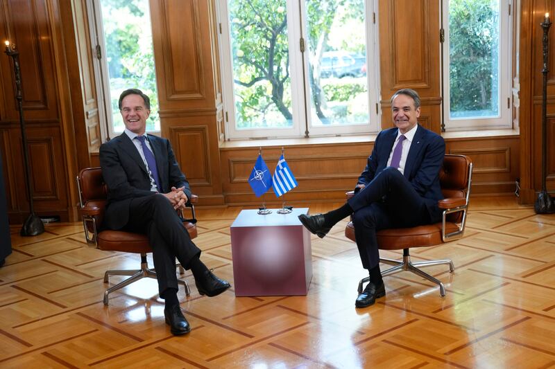 Greek Prime Minister Kyriakos Mitsotakis met Nato Secretary-General Mark Rutte in Athens on Tuesday (Petros Giannakouris/AP)