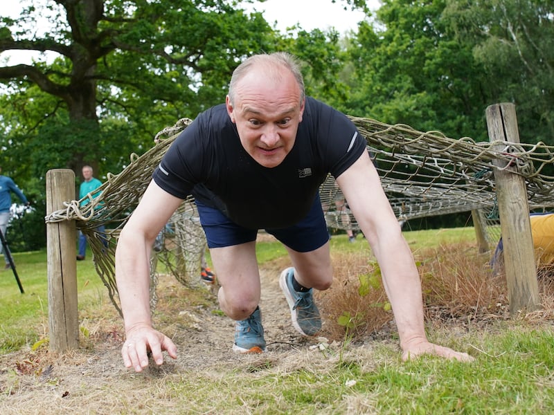 Lib Dem leader Sir Ed Davey attempted an assault course during an election campaign visit to Arena Pursuits in Wadhurst, Kent