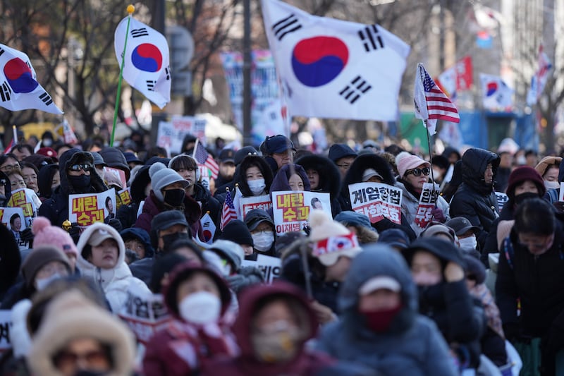 Supporters of Yoon Suk Yeol staged a rally against his impeachment in Seoul on Saturday (Lee Jin-man/AP)