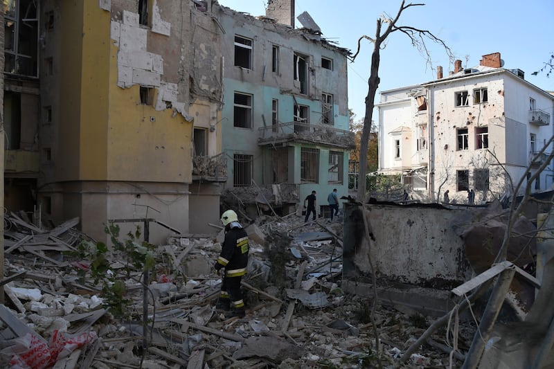 Rescuers search for victims in an apartment building destroyed by a Russian missile attack in the centre of Lviv, western Ukraine, on September 4 (Mykola Tys/AP)