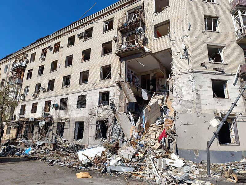 An apartment building in Kharkiv damaged by a Russian air strike on Saturday which killed at least three people and injured 23 others (Ukrainian Emergency Service/AP)