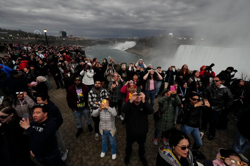 On Monday, millions of people gathered in places where the solar eclipse’s path meant they could witness the moon entirely cover the sun’s disk (Matt Rourke/AP)