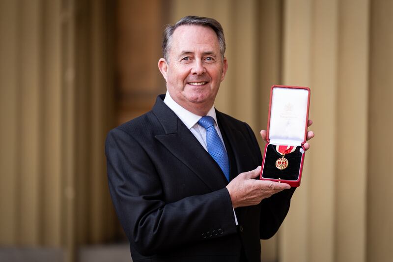 The Right Honourable Sir Liam Fox after being made a Knight Bachelor at an investiture ceremony at Buckingham Palace