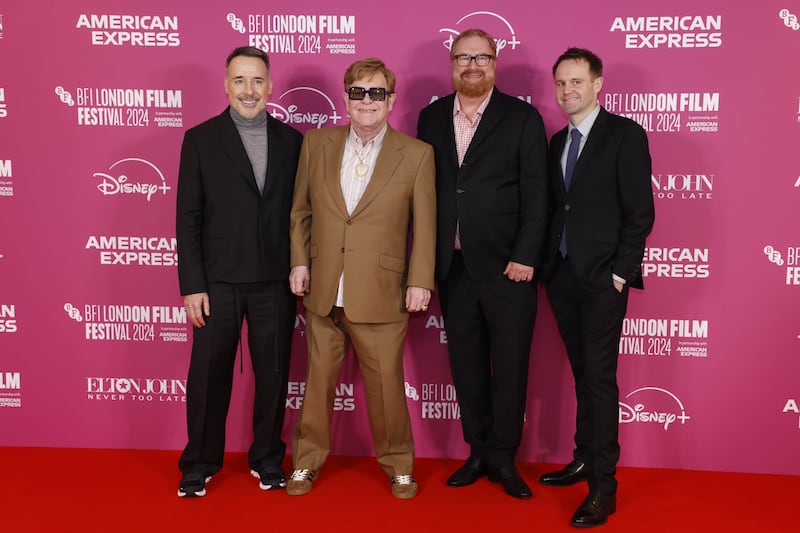 David Furnish, Sir Elton John, director RJ Cutler and producer Trevor Smith at the premiere