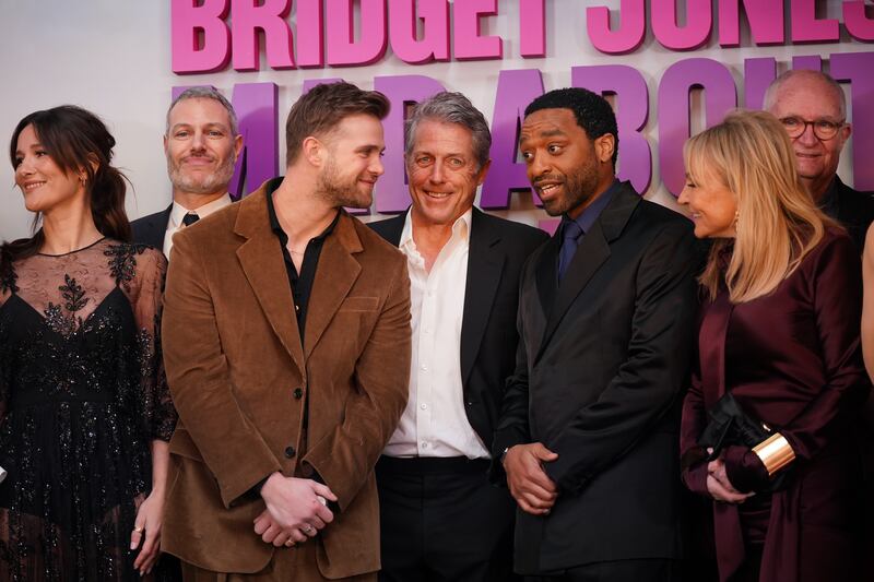 Left to right, Sarah Solemani, director Michael Morris, Leo Woodall, Hugh Grant, Chiwetel Ejiofor, Helen Fielding and Jim Broadbent attend the Bridget Jones: Mad About the Boy world premiere