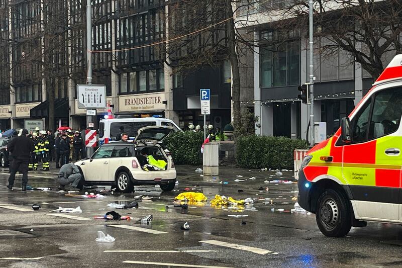 Emergency services attend the scene of an accident after a car hit a group of people in Munich, Germany (Christoph Trost/dpa via AP)