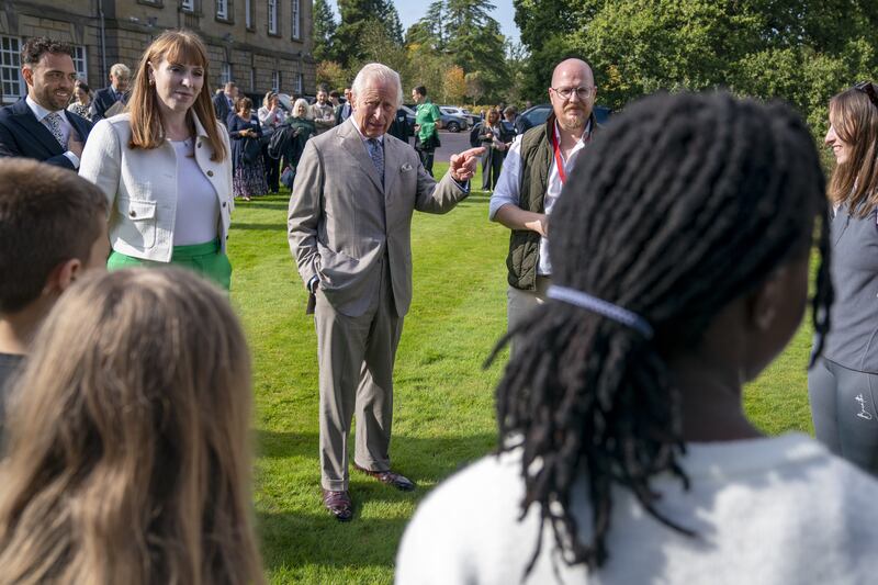 The King with Deputy Prime Minister Angela Rayner meets staff and students who have been taking part in woodland educational activities