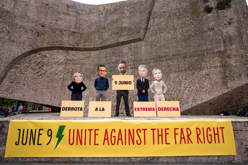 Activists from Avaaz wearing masks of far right politicians urged Europeans to unite to defeat the far-right in upcoming EU elections (Avaaz/AP)