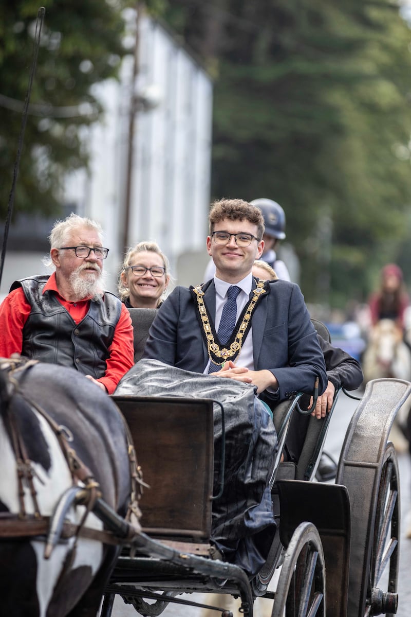 24/08/24 REPRO FREE.. Mayor with Denis Butler during the horse parade

Crowds of locals and visitors made their way to the Lammas Fair this bank holiday weekend.

Events on the Saturday started the fair weekend off with a beach dog ability display, a new addition for 2024. Market stalls lined the streets as visitors enjoyed the Naturally North Coast and Glens Artisan Market.
Mayor of Causeway Coast and Glens Councillor Ciarán McQuillan presented the heavy horse show prizes and also met with the many visitors who came along for the long weekend. Pictures Causeway Coast & Glens Borough Council