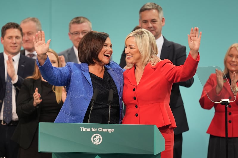 Sinn Fein's President Mary Lou McDonald and Stormont First Minister Michelle O'Neill (third from right) wave during the Sinn Fein Ard Fheis at the Technological University of the Shannon, Athlone.