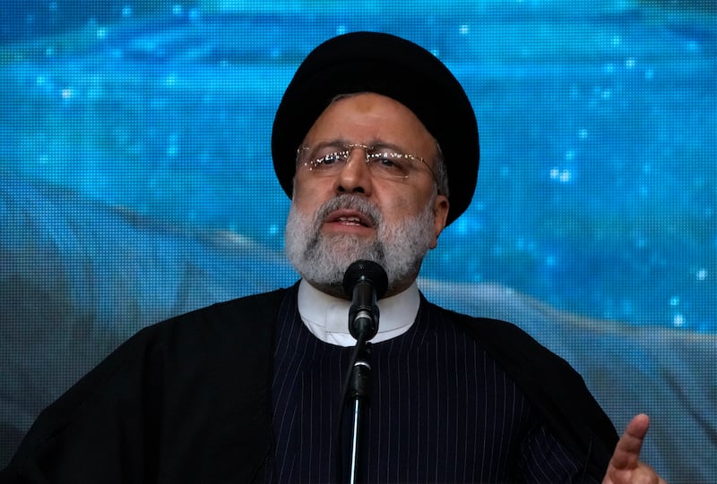 Iranian President Ebrahim Raisi speaks during a commemoration for the late Revolutionary Guard General Qassem Soleimani on Wednesday (Vahid Salemi/AP)