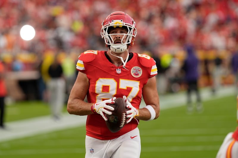 Kansas City Chiefs tight end Travis Kelce warms up before the start of an NFL football game against the Baltimore Ravens (AP Photo/Charlie Riedel)