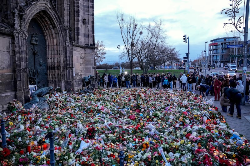 The church is situated close to the Christmas market where a car drove into a crowd on Friday (AP)