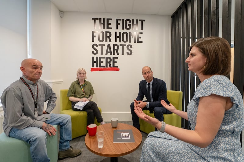 The Prince of Wales meets workers from the homelessness sector during a visit to Shelter Scotland in Aberdeen