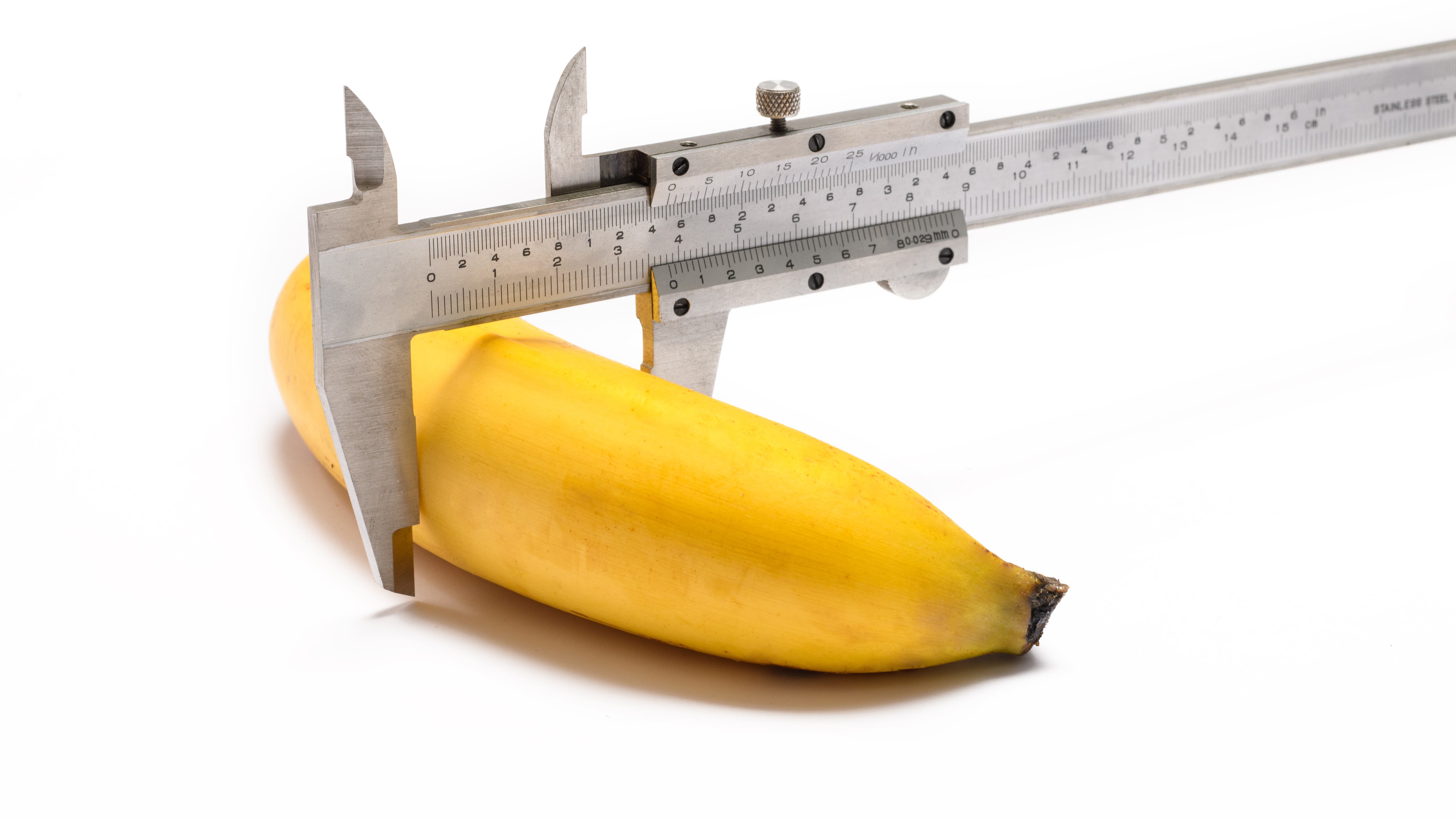 Caliper measuring the diameter of a banana