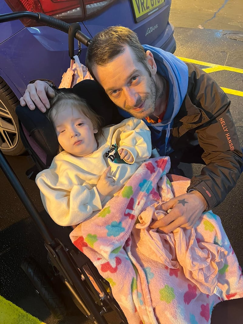 Brianna with her uncle Jonathan, who drove from Co Antrim to London, via ferry, to bring her and her parents home.