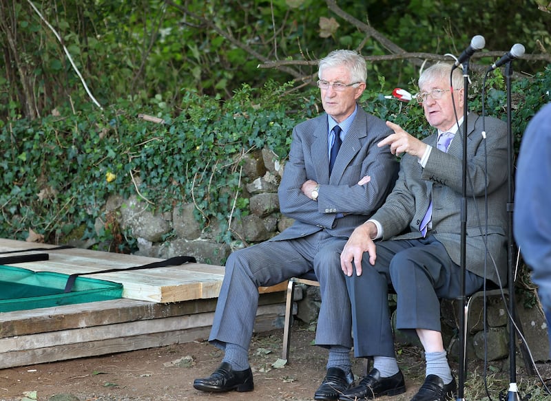 Derry GAA team-mates and legends Jim McKeever (on left) and Harry Cassidy on right, pictured together in 2013 as they waited for the remains of Seamus Heaney to be brought home for burial at St Mary's in Bellaghy following Heaney's death in Dublin. Jim McKeever passed away today while Harry Cassidy of Bellaghy passed away just a few days ago. Picture: Margaret McLaughlin