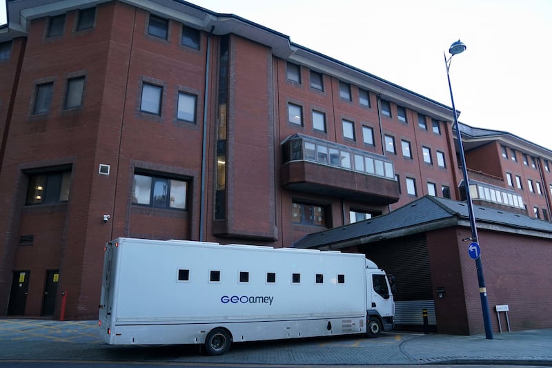 A custody van enters Birmingham Crown Court ahead of the trial