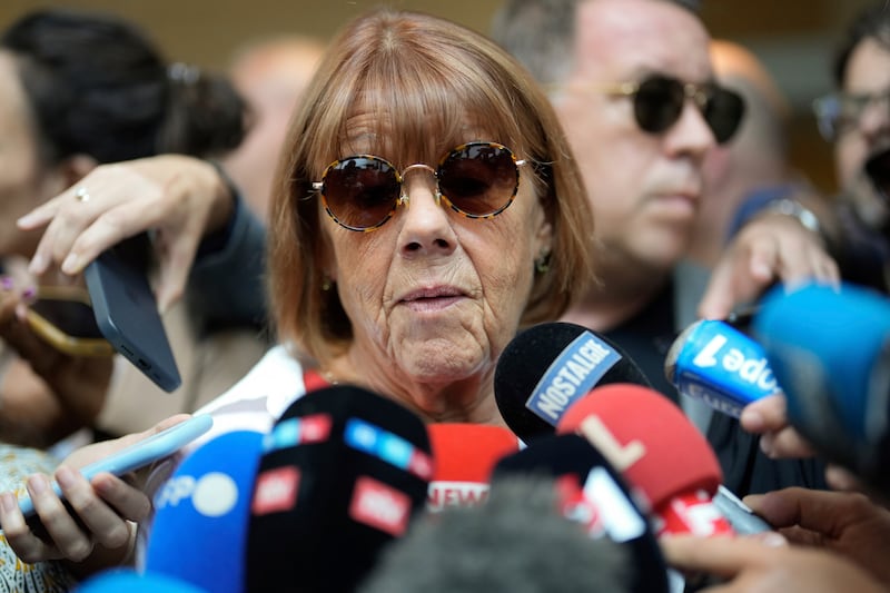 Gisele Pelicot speaks to the media as she leaves the court in Avignon (Lewis Joly/AP)