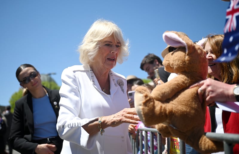 Queen Camilla was given a soft toy as she met one well-wisher