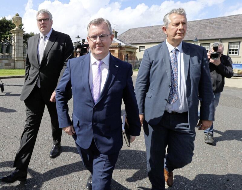 DUP leader Sir Jeffrey Donaldson with deputy leader Gavin Robinson and former leader Edwin Poots. PICTURE: HUGH RUSSELL