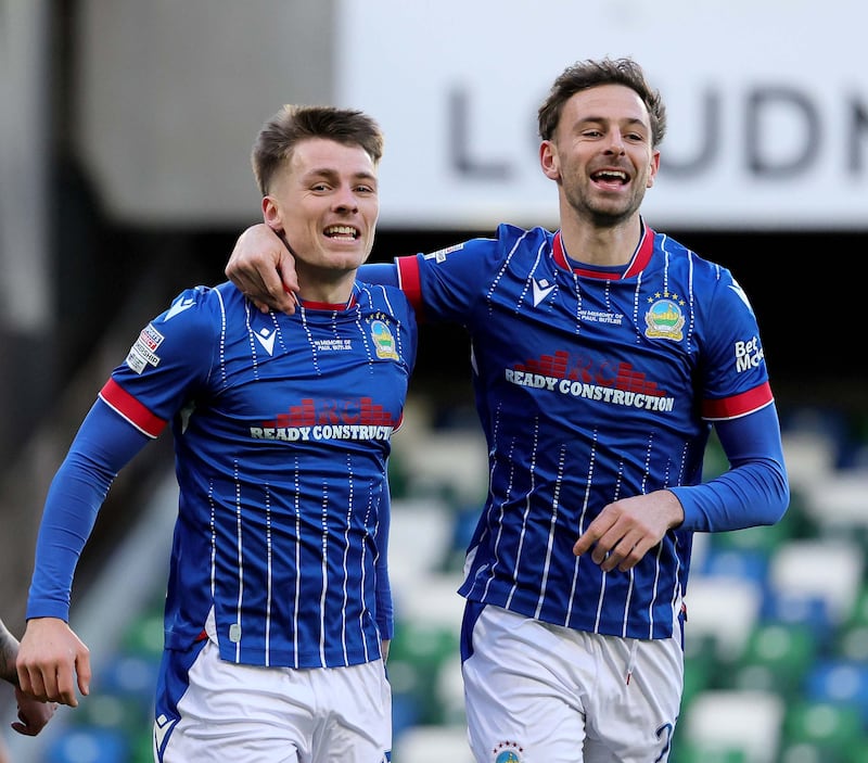 Linfield's Christopher McKee celebrates with team-mate Matt Fitzpatrick after scoring the only goal of the game in Saturday's win over Glenavon at Windsor Park