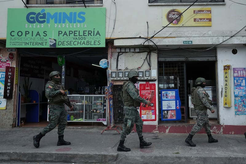 Soldiers on patrol during the state of emergency in Quito (Dolores Ochoa/AP)