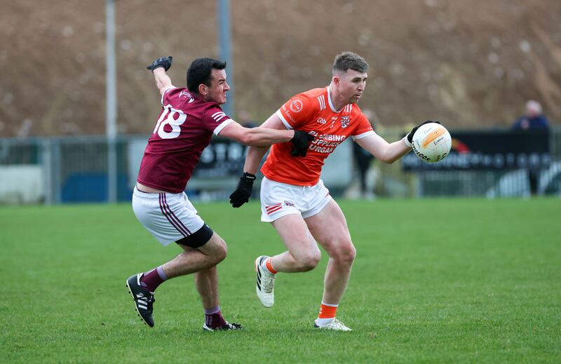 Ballymacnab’s Cormac McKee  and  Clann Eireann’s Tiernan Kelly  during Sunday’s game at Pearse Og Park.
PICTURE COLM LENAGHAN