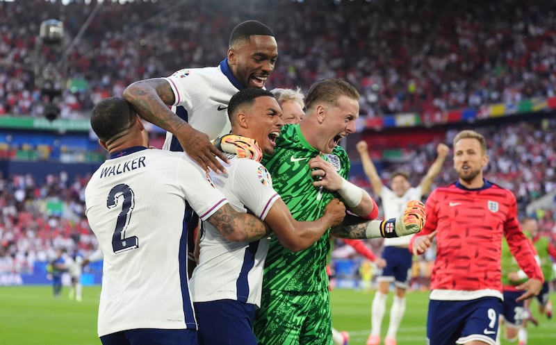 Trent Alexander-Arnold (centre) celebrates after scoring the winning penalty