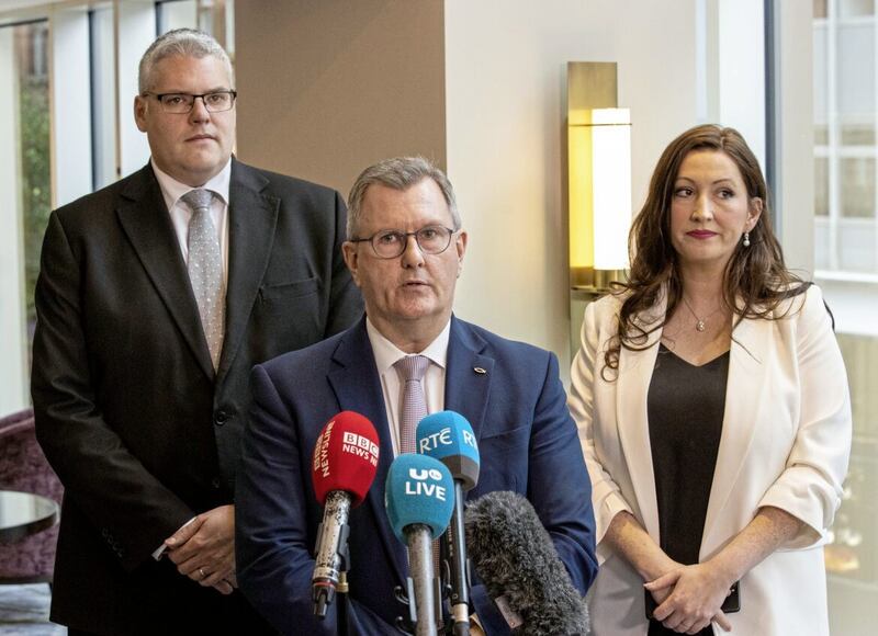 Sir Jeffrey Donaldson with party colleagues Gavin Robinson and Emma Little-Pengelly after a meeting with Taoiseach Micheal Martin