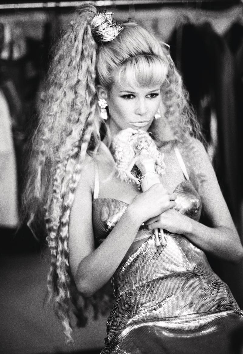 Claudia Schiffer with a Barbie doll