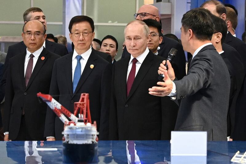 Vladimir Putin and Chinese Vice President Han Zheng visit the Russian-Chinese EXPO in Harbin, northeast China (Sergei Bobylev, Sputnik, Kremlin Pool Photo via AP)