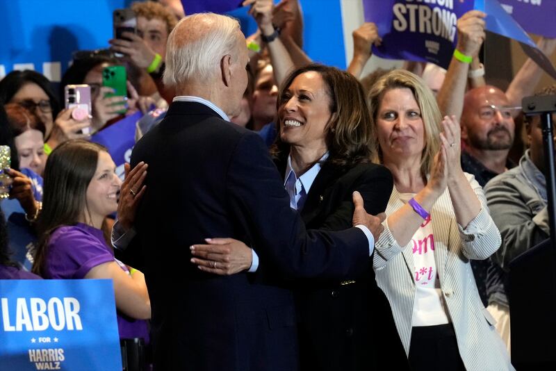 Democratic presidential nominee US Vice President Kamala Harris campaigns with President Joe Biden (Jacquelyn Martin/AP)