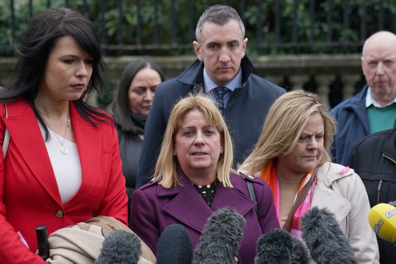 Martina Dillon, whose husband, Seamus, was shot dead in Dungannon, outside Belfast High Court with supporters after last week’s ruling