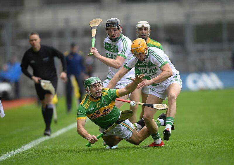 Dunloy's Nigel Elliott is challenged by Ballyhale's Paddy Mullan and Richie Reid during the AIB All-Ireland Club SHC final at Croke Park            Picture: Mark Marlow