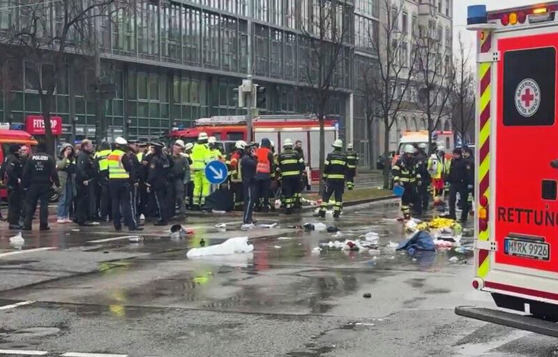 Emergency services attend the scene of an accident after a car hit a group of people in Munich, Germany (Peter Kneffel/dpa via AP)