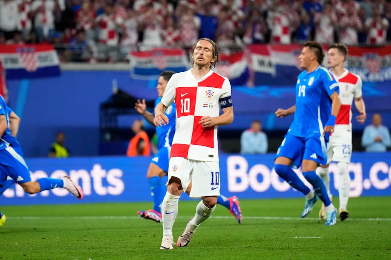 Luka Modric is one of two Croatians to miss penalties in an otherwise flawless group stage from the spot (Ebrahim Noroozi/AP)