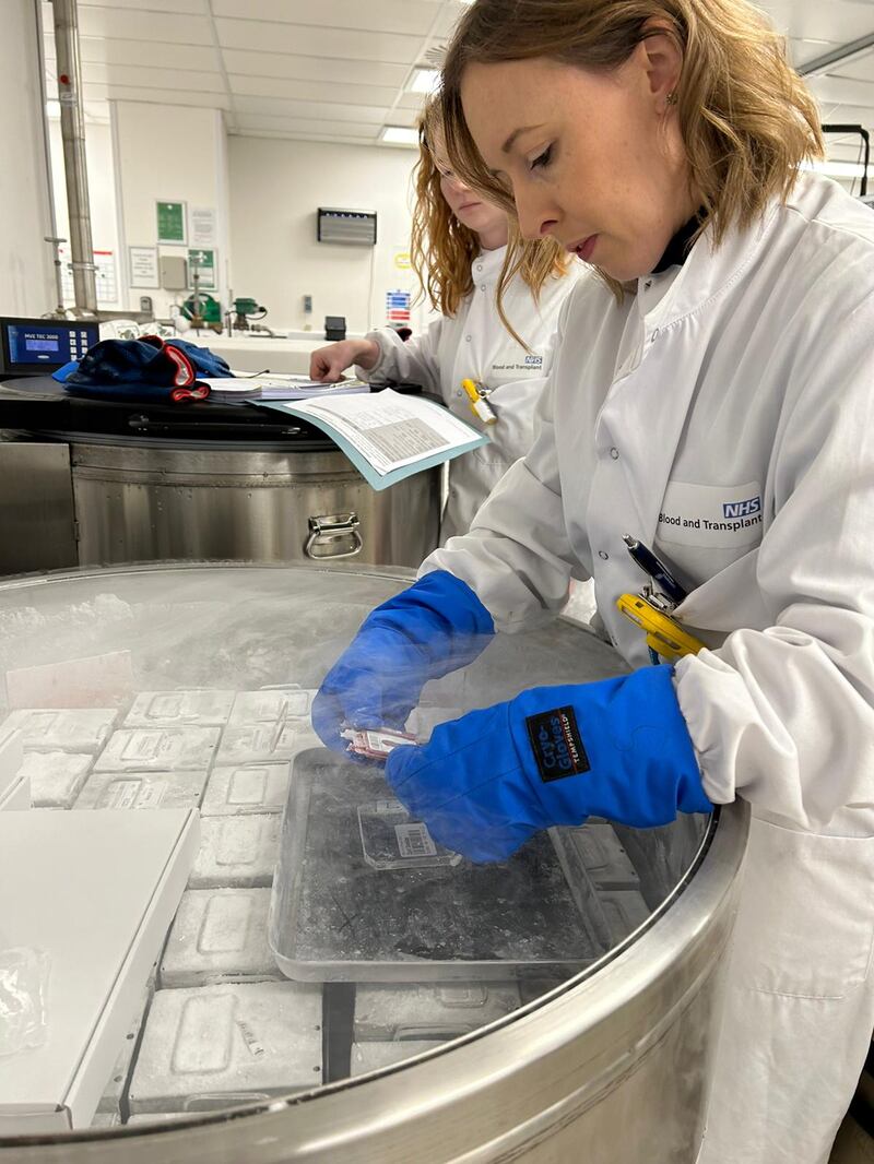 Staff from NHS Blood and Transplant getting the frozen cord stem cells out of storage at NHSBT Filton in preparation for Gunner Lewis-Vale’s transplant. The cells were harvested from the blood in a baby’s umbilical cord, which was donated in 2008. It has been frozen at temperatures of -150C for 15 years.