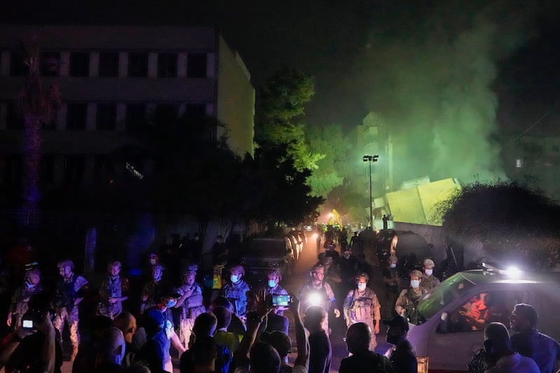 Lebanese soldiers secure the area at the site of an Israeli airstrike in Beirut’s southern suburbs (Bilal Hussein/AP)