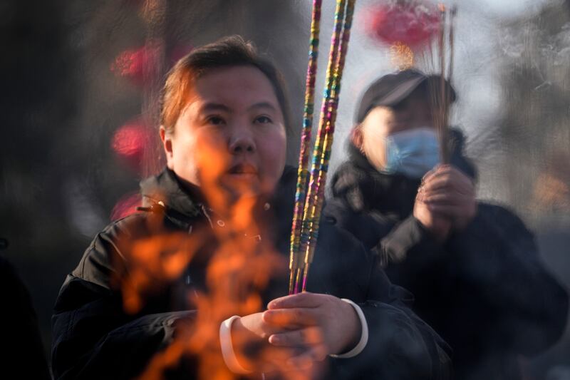 Prayers were offered at the the Dongyue Temple in Beijing on the first day of the Year of the Snake (AP)