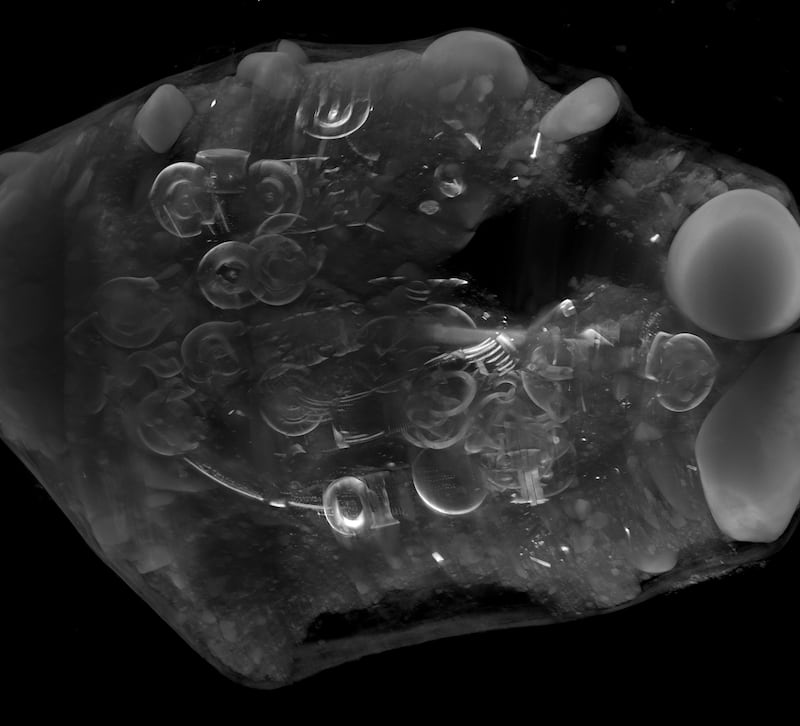 After being extracted from the ground in a single block of earth the hoard was scanned at a specialised facility, which showed detail of individual objects