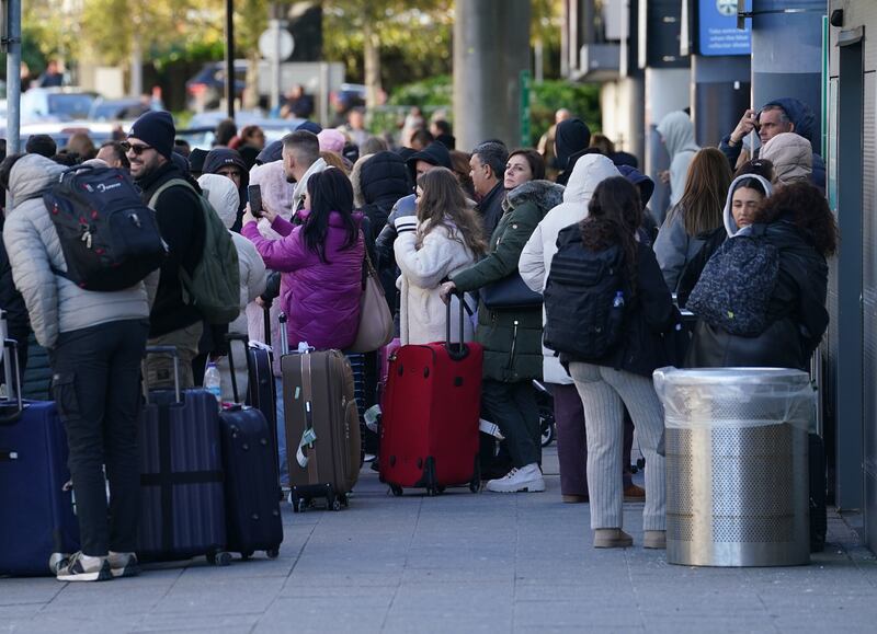 Passengers at Gatwick airport near Crawley, West Sussex