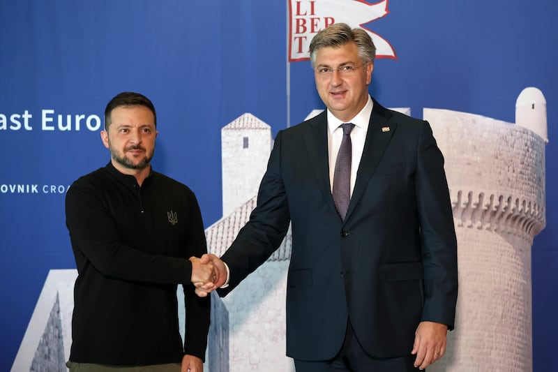 Ukrainian President Volodymyr Zelensky was welcomed by Croatian Prime Minister Andrej Plenkovic in Dubrovnik (Pool via AP)