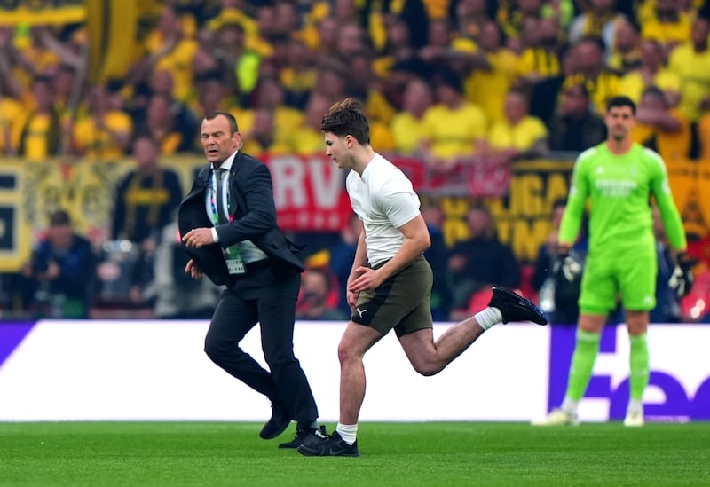 Pitch invaders forced play to be halted early on in the Champions League final