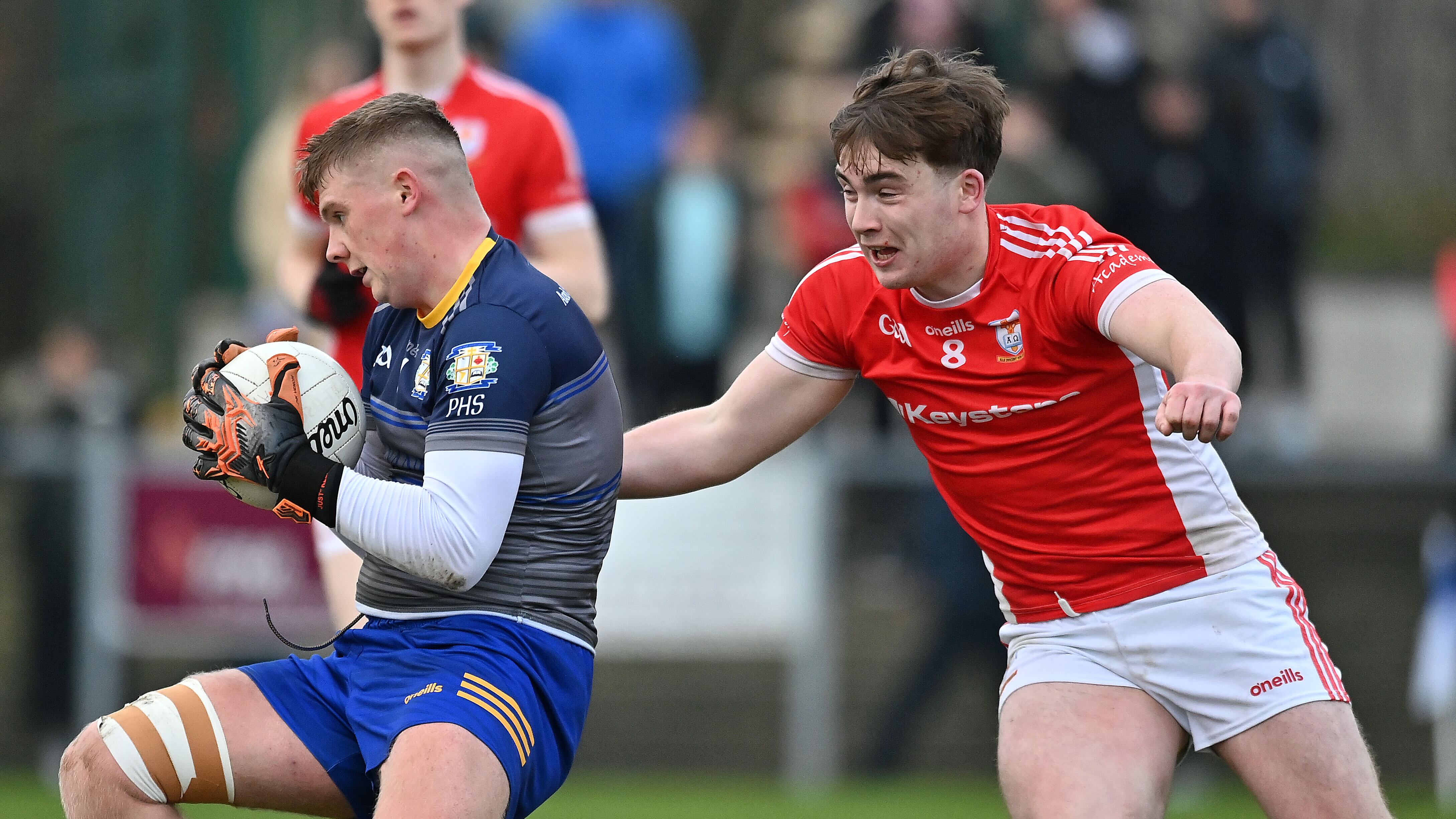 St Patrick’s, Dungannon midfielder Sean Hughes (right) puts the pressure on Patrician College, Carrickmacross’s Oran Finnegan during the MacRory Cup quarter-final clash at Galbally