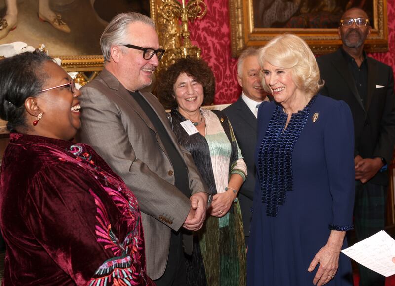 The Queen with (left to right) Malorie Blackman, Charlie Higson and Francesca Simon