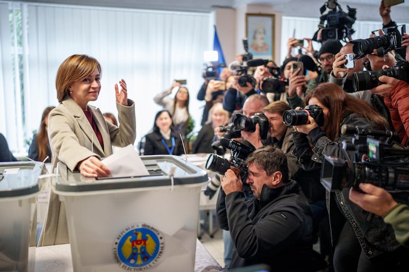 Moldova’s President Maia Sandu prepares to cast her vote, in Chisinau, Moldova (Vadim Ghirda/AP)